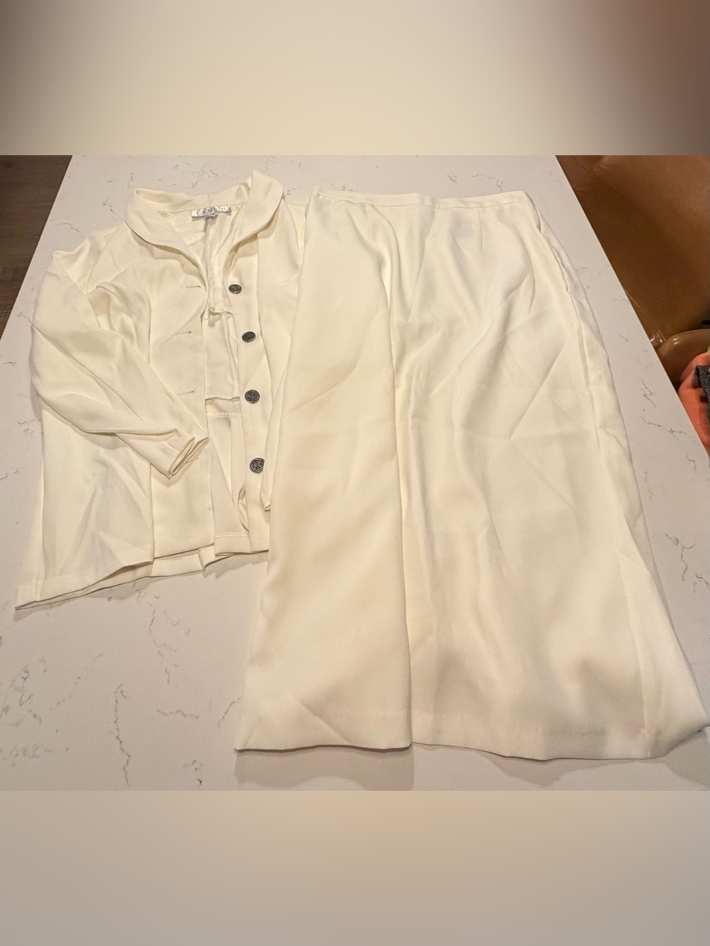 Cream women’s skirt suit